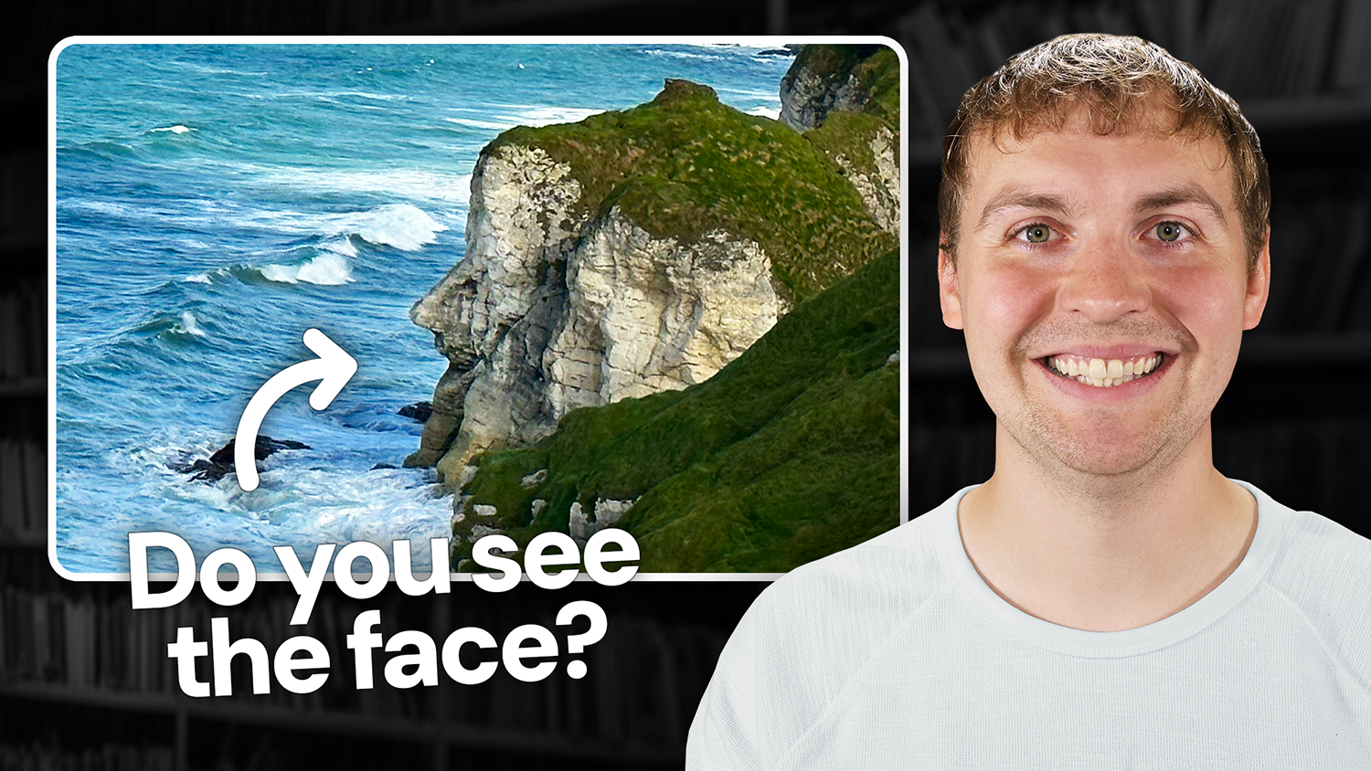 A young man with brown hair and a broad smile, wearing a light grey crew neck shirt, stands on the right. To the left is an image showing a rocky, grassy cliff by the ocean that resembles a human face in profile. A curved white arrow points toward the formation, and bold white text below asks, "Do you see the face?" The background behind the man and image features dark, blurred bookshelves in a library.