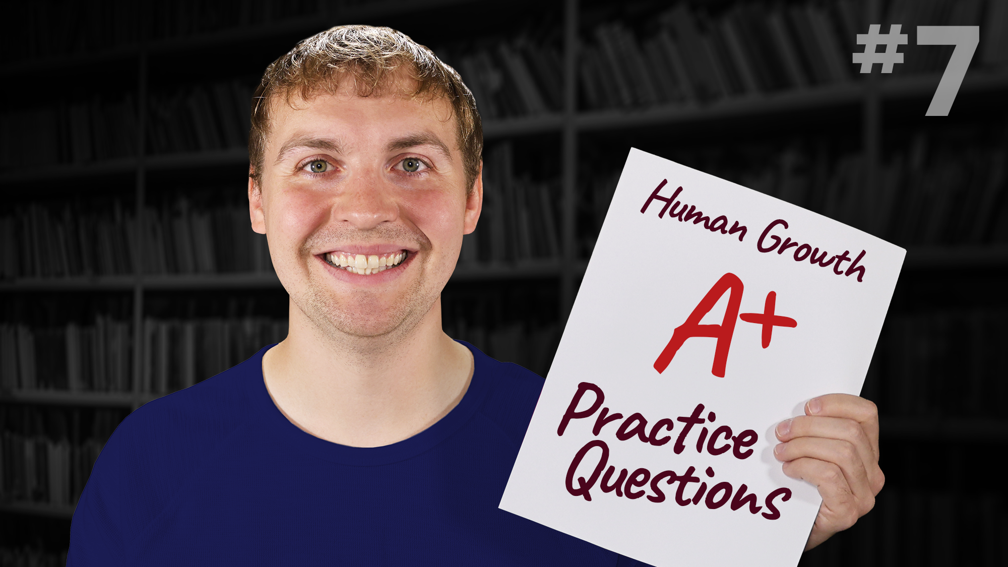 A young man with brown hair and a broad smile, wearing a dark blue crew neck shirt, stands in front of a blurred background of dark bookshelves. He holds a white paper featuring the text "Human Growth" at the top in dark red script, a large "A+" in bright red marker in the center, and "Practice Questions" at the bottom in dark red script.